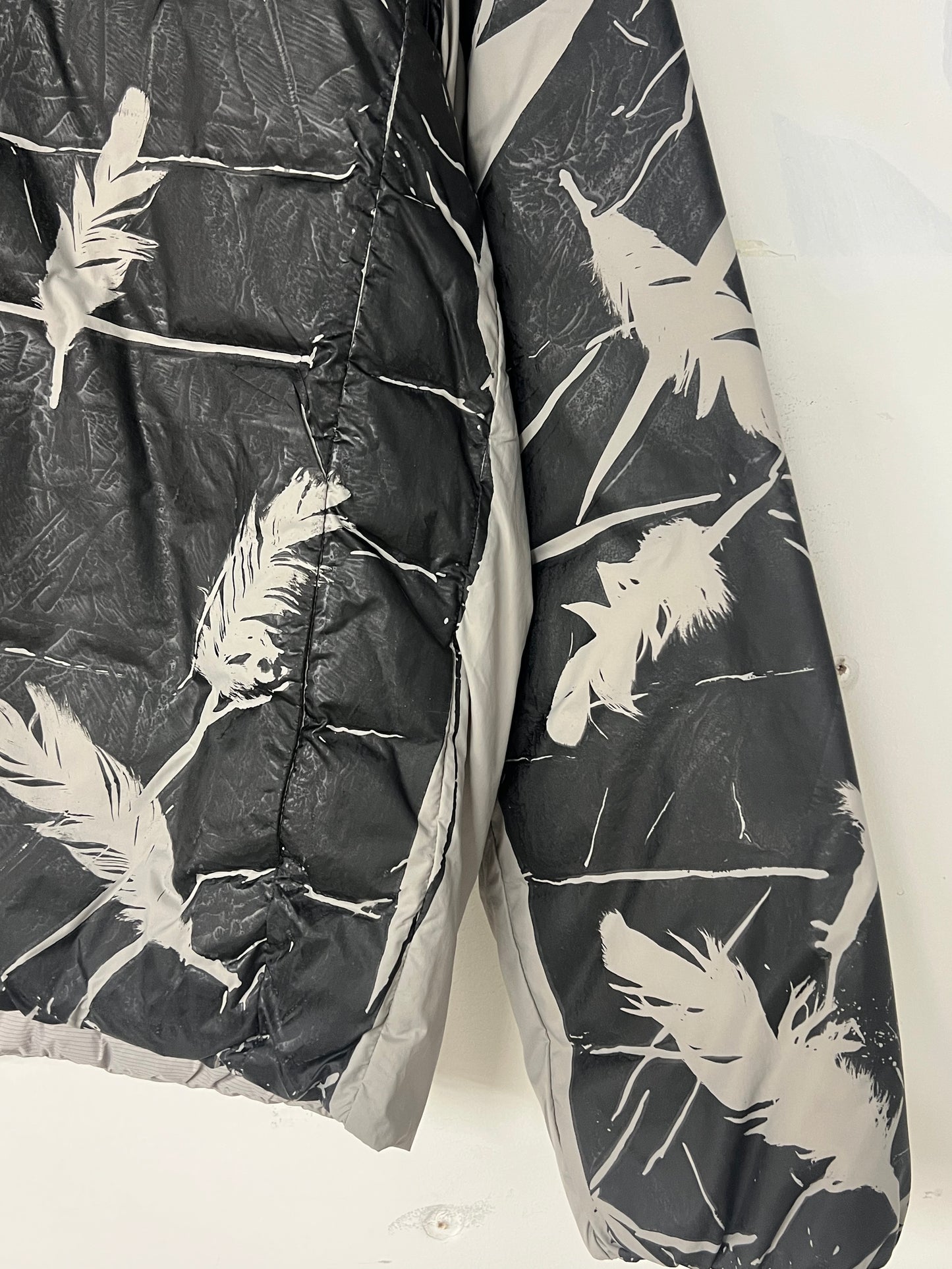 Nylon Puffer Jacket with Black Feather Print
