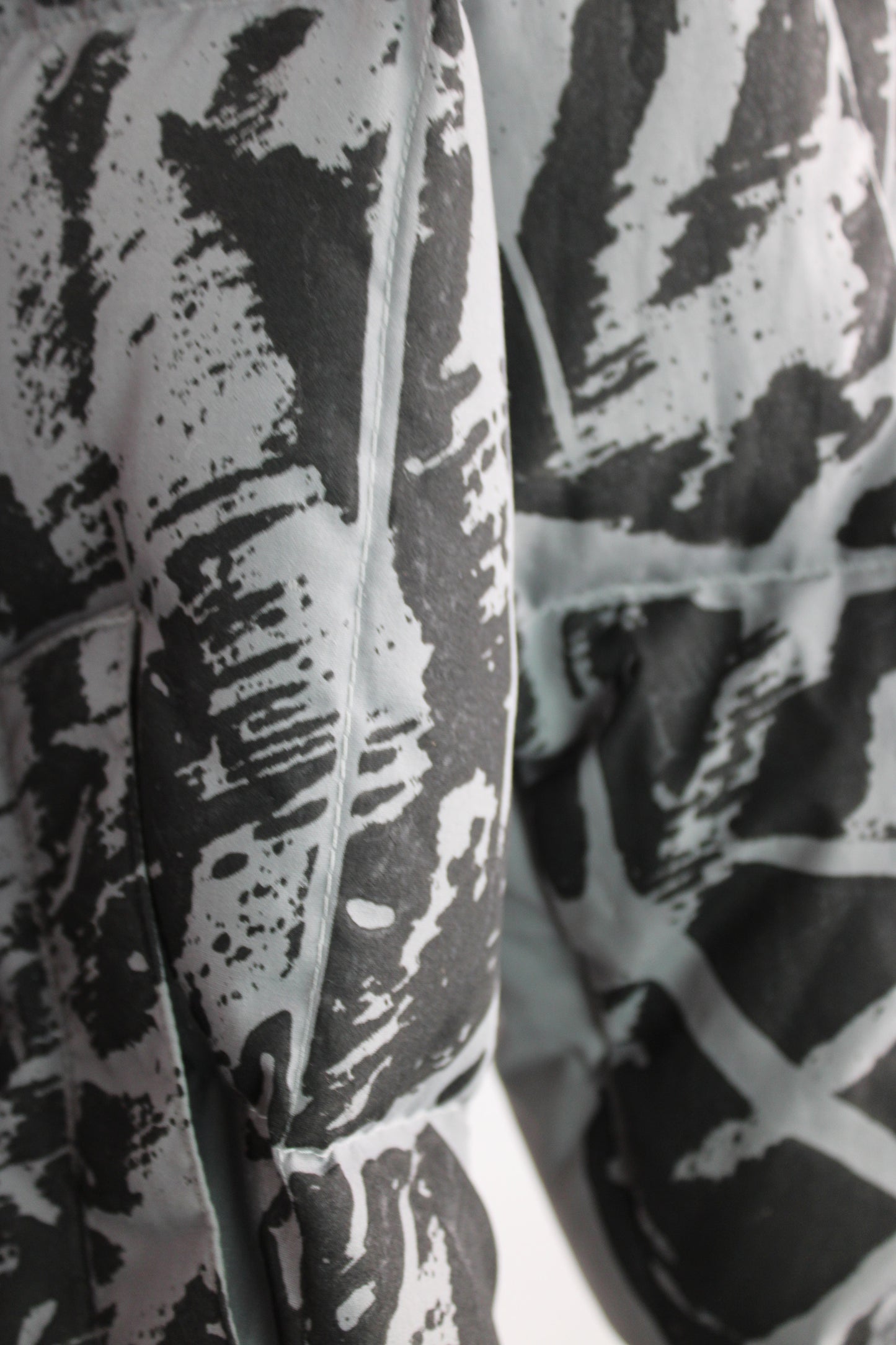 Grey Down Puffer Coat with Black Abstract Feather Print